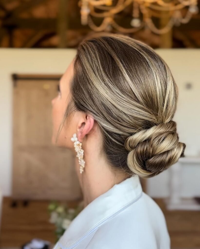 Sleek low twisted bun – elegant hairstyle for formal events.