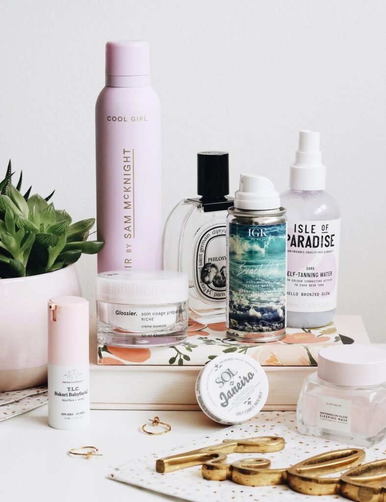 Assortment of skincare products including moisturizer, serum, and spray arranged on a surface showcasing hydrating skincare ideas for glowing skin