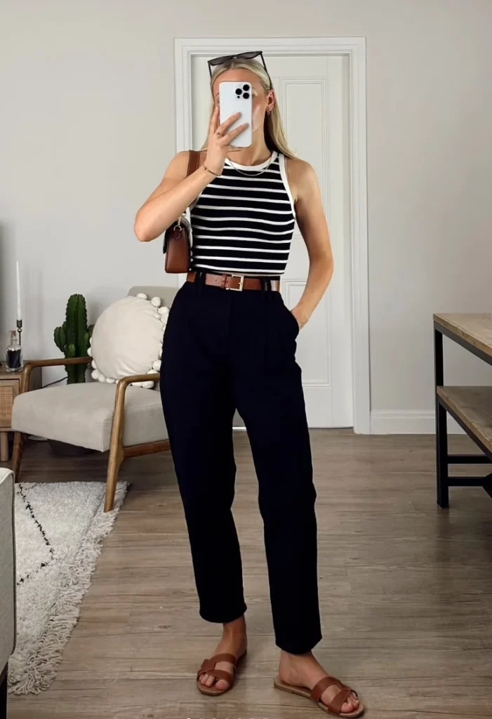 Monochrome casual outfit with striped top and black trousers — ideal for a comfy, polished day look. Outfits Casuales.