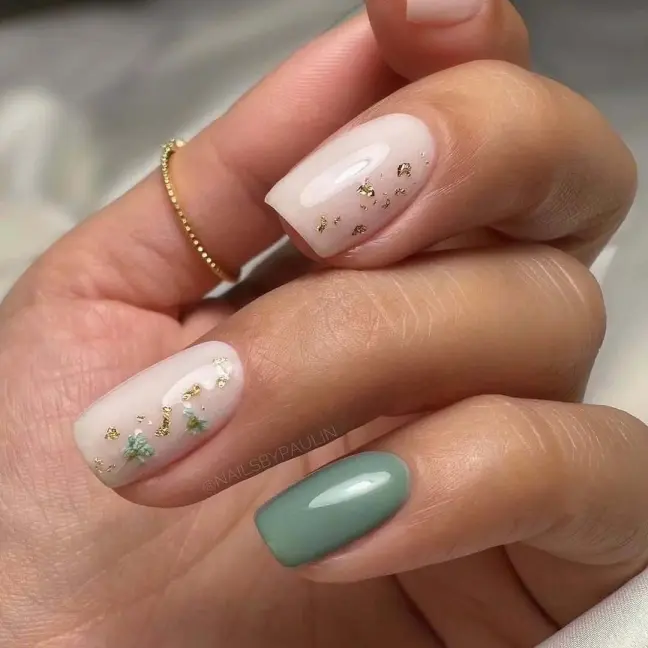 Elegant nail ideas with mint green, gold foil, and floral details on short square nails.