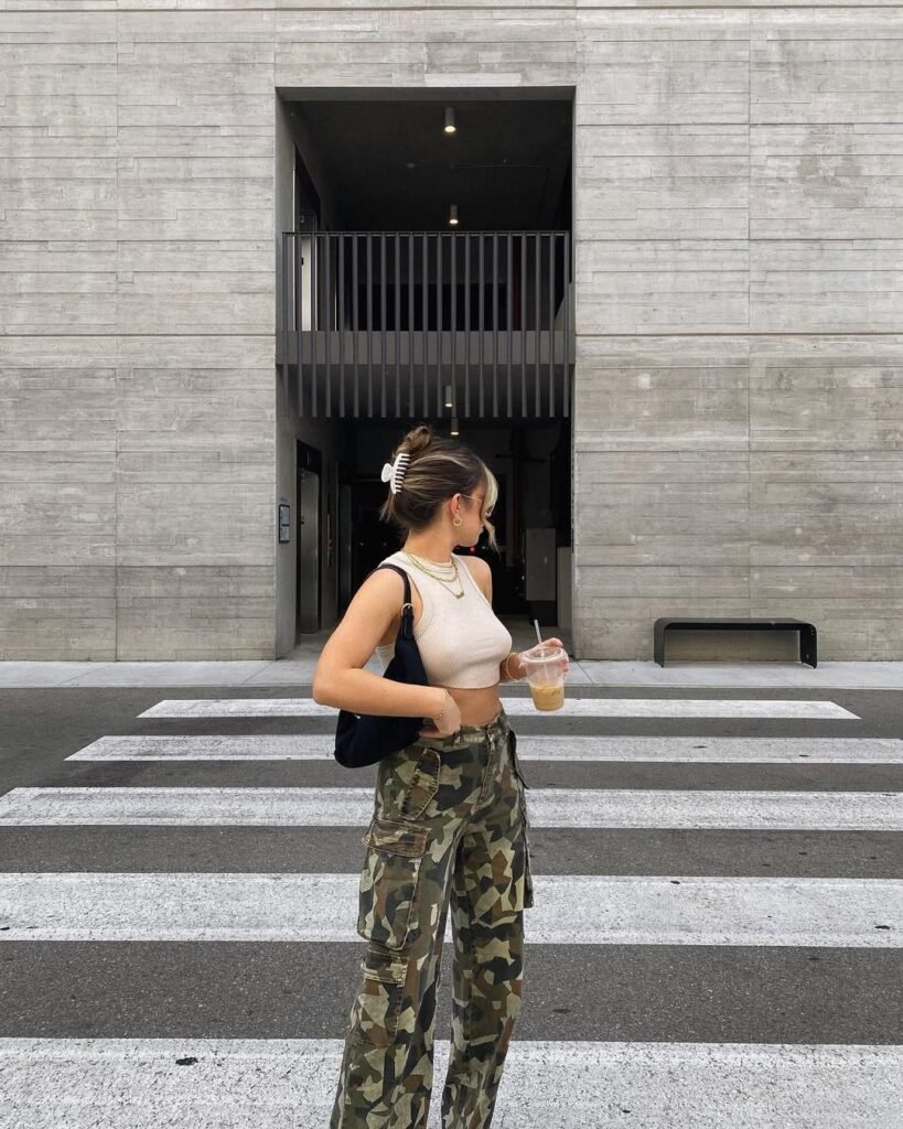 Casual Camouflage Pants Outfit showcasing a beige ribbed crop top with camo utility pants and layered gold jewelry.