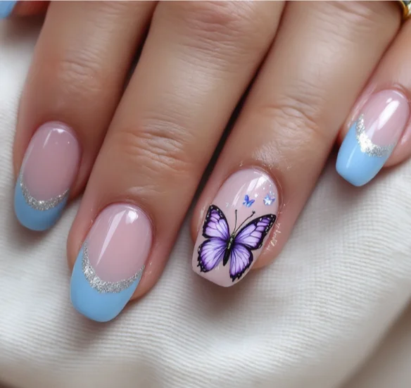 Pastel blue French tip acrylic nails with a purple butterfly design.
