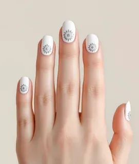 White Summer Nails with a minimalist floral sunburst design on each nail, creating a fresh and delicate seasonal look.
