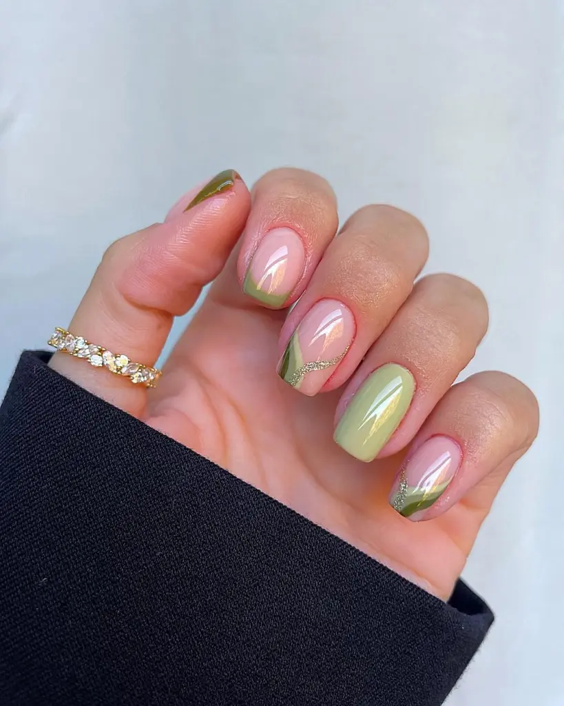 Short fall nail designs with pink and green diagonal French tips and glitter accents.