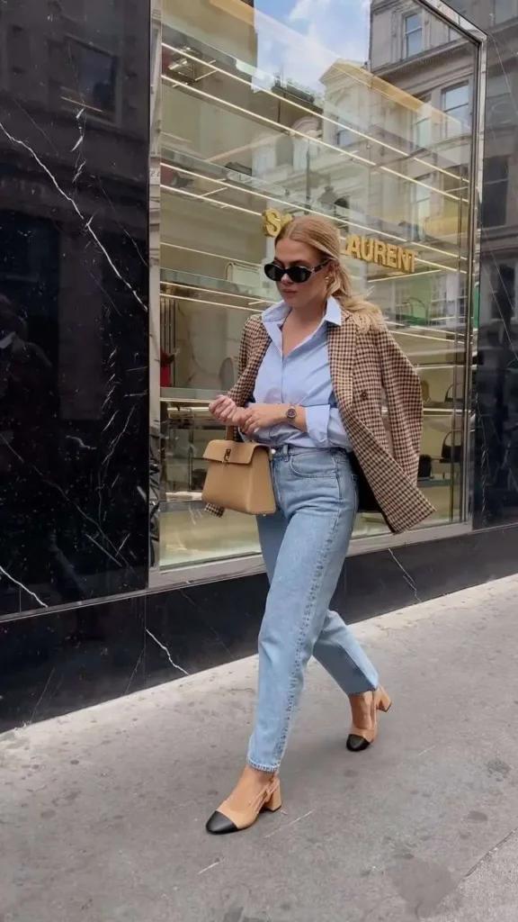 Casual elegance with light blue shirt, plaid blazer, high-rise jeans, and cap-toe pumps for old money spring vibes.