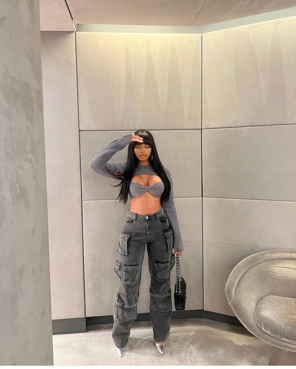 Bold cargo pants outfit with grey cargo pants and a statement cutout top.
