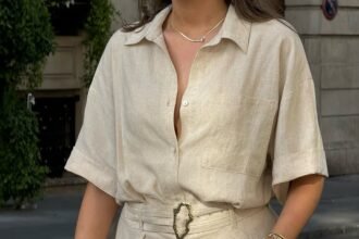 Neutral-toned linen short set with gold accessories – old money outfits with minimalist summer vibes.