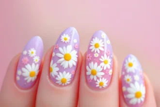 Lavender acrylic nails with 3D white daisies on an almond-shaped base for a playful garden look.