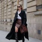 Fashion-forward trench coat outfit styled with casual chic elements.